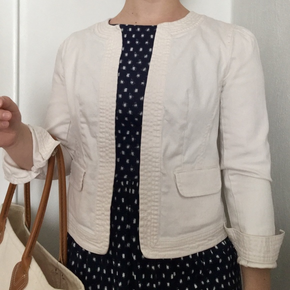 white collarless denim jacket